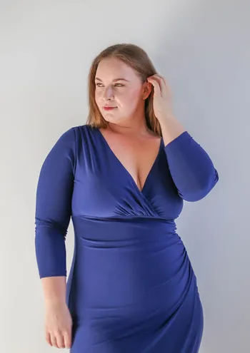 Mandy Brooke in blue dress.